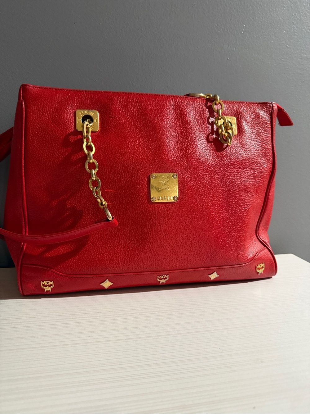 MCM shoulder bag include COA